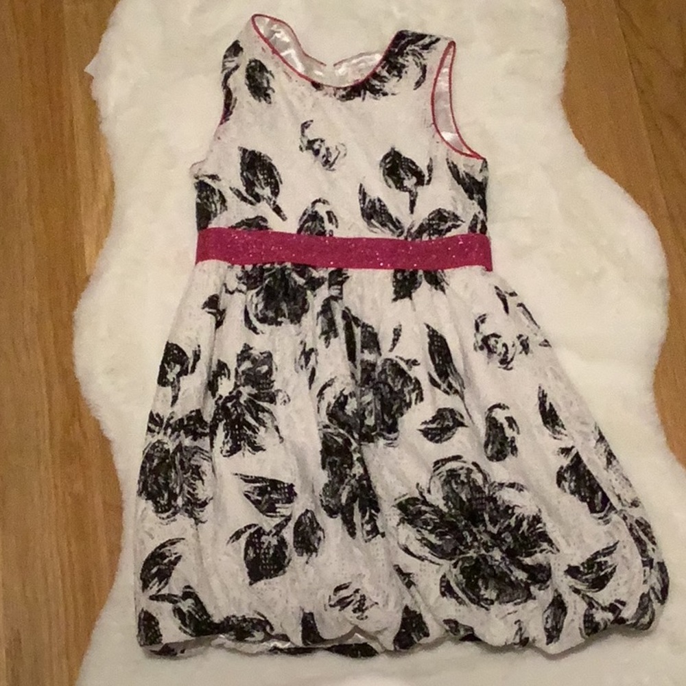 Cute black dress for special occasions.